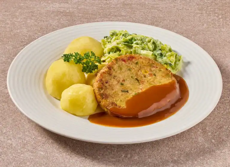Groenteburger Met Prei En Gekookte Aardappelen