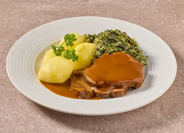 Varkensrollade In Jus Met Andijvie A La Creme En Gekookte Aardappelen