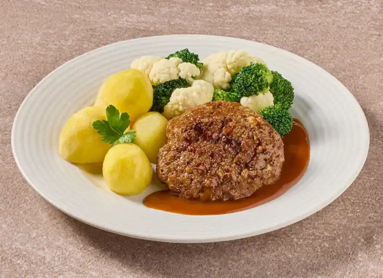 Gehaktbal In Jus Met Bloemkool- En Broccoliroosjes En Gekookte Aardappelen